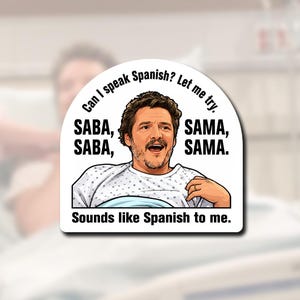 May include: A white sticker featuring a cartoon illustration of a person with brown hair and a beard wearing a hospital gown. The text reads: Can I speak Spanish? Let me try. SABA, SABA, SAMA, SAMA. Sounds like Spanish to me. The design has a curved top.