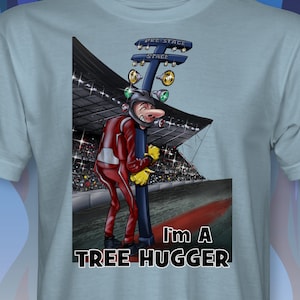 May include: A light blue t-shirt with a cartoon illustration of a race car driver hugging a tree. The text "I'm a Tree Hugger" is printed below the illustration.