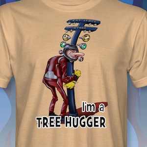 May include: A tan t-shirt with a cartoon illustration of a person in a racing suit hugging a tree-like structure with the words "I'm a Tree Hugger" printed below.