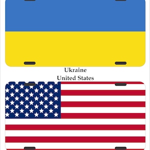 May include: Two license plates with the flags of Ukraine and the United States. The Ukrainian flag is blue and yellow, and the American flag is red, white, and blue.