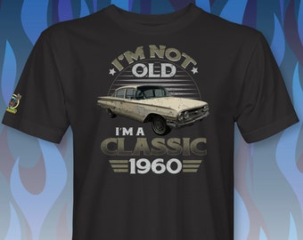 May include: Black t-shirt with a vintage car graphic and the text "I'm not old, I'm a classic 1960".