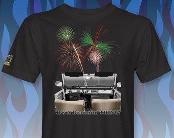 May include: Black t-shirt with a white jeep and fireworks in the background. The text "It's A Beautiful THING!" is printed on the shirt.