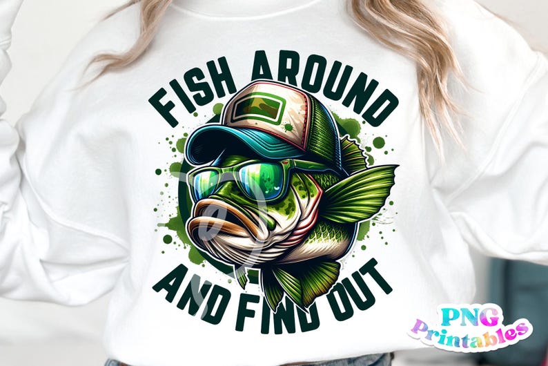 May include: White sweatshirt with a green, black, and blue graphic of a fish wearing sunglasses and a hat. The text "Fish Around and Find Out" is printed on the sweatshirt.