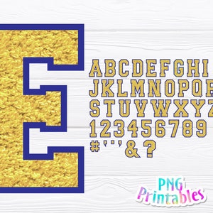 Könnte beinhalten: Goldener Glitzerbuchstabe E mit blauem Umriss. Das Bild enthält auch ein vollständiges Alphabet, Zahlen und Symbole im gleichen Stil.