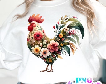 May include: A white sweatshirt with a colorful floral rooster design. The rooster is made up of flowers in shades of pink, red, yellow, and green.