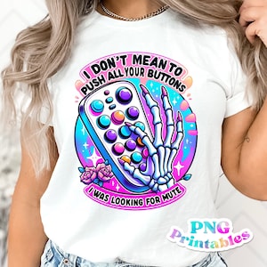 May include: A white t-shirt with a colorful graphic of a skeleton hand pressing buttons on a pop-it toy. The text reads "I don't mean to push all your buttons I was looking for mute".