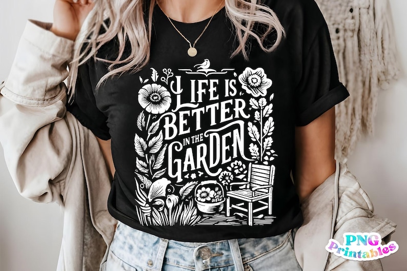May include: A black t-shirt with a white graphic design featuring a floral motif and the text "Life is better in the garden".