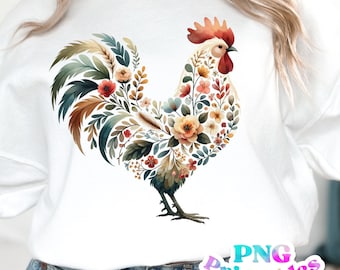 May include: A white sweatshirt with a floral rooster design. The rooster is made up of flowers and leaves in shades of pink, red, orange, yellow, green, and blue.