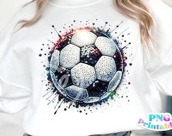 May include: A white sweatshirt with a colorful graphic of a soccer ball with a splatter paint effect.