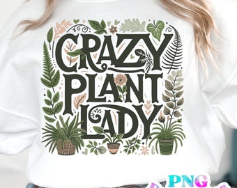 May include: White sweatshirt with a green and brown graphic design that says "Crazy Plant Lady". The design features a variety of plants and flowers.