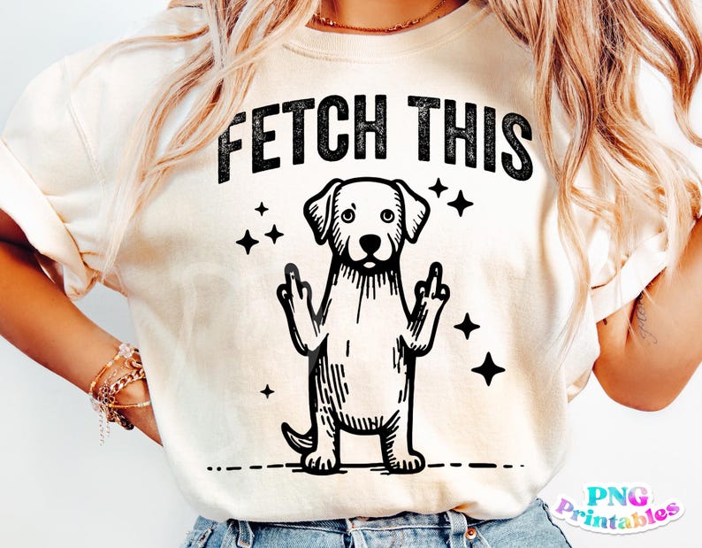 May include: A white t-shirt with the text "FETCH THIS" in black lettering. A black and white illustration of a dog with its middle fingers raised is below the text.