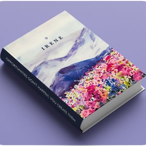 May include: A book with a watercolor illustration of mountains and flowers. The title of the book is "IRENE" and the text on the spine reads "OPPORTUNITIES DON'T HAPPEN, YOU CREATE THEM."