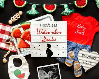 May include: A baby shower announcement with a watermelon theme. A red onesie with the text "Baby Smith" is surrounded by watermelon slices, a wooden sign that says "Don't eat watermelon seeds!" and a white heart-shaped sign with the text "February 2023".