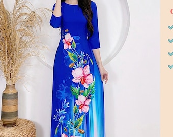 May include: A blue long-sleeved dress with a floral print. The dress is made of silk and has a fitted bodice and a flowing skirt. The dress is perfect for a special occasion or a night out.