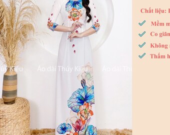 Áo dài trắng nữ sinh nền trắng in hoa sen - Girl's white ao dai with lotus flower - White Ao Dai Viet Nam - Pre-made Ao Dai Viet Nam