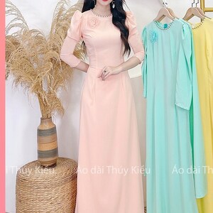 Áo dài lụa Nhật trơn tay bồng đính hoa voan màu hồng - Sleeveless silk with pink chiffon flowers Ao Dai Viet Nam - Pre-made AO DAI Viet nam