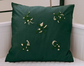 Hand-embroidered cushion cover with flowers