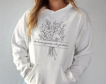 He Turns Graves Into Gardens Unisex Cotton Hoodie, Trending Floral Christian Clothing, Jesus Lover Hoodie, Religious Apparel for Women