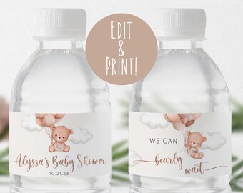 May include: Editable water bottle labels with a cute cartoon bear holding balloons. The labels feature the text "Alyssa's Baby Shower" and "We can bearly wait".