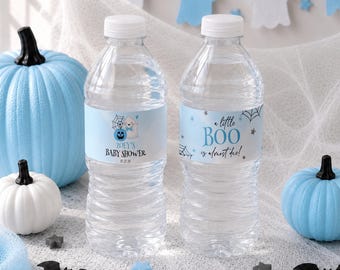 May include: Two clear plastic water bottles with light blue labels. One label features a ghost, a pumpkin, and the text "Zoey's Baby Shower 10.27.26". The other label features a spider web and the text "a little BOO is almost due!".