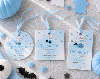 May include: Three light blue gift tags with light blue ribbons, featuring a cartoon ghost, pumpkins, and stars. The text reads: Thank you for showering our little boo with so much love! Joey's baby shower 10.27.26. Includes round, square, and rectangular tags.