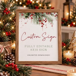 May include: A rectangular wooden frame containing a white sign with red text that reads Custom Sign, FULLY EDITABLE, 8X10 SIGN, and UNLIMITED DOWNLOADS!, decorated with a watercolor illustration of green pine branches and red berries.