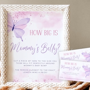 Puede incluir: Un juego de baby shower rosa y morado con un diseño de mariposa. El juego se llama "How Big Is Mommy's Belly?" y pide a los invitados que corten un trozo de hilo del tamaño que creen que se ajustará perfectamente alrededor del vientre de la madre. La persona que más se acerque a la longitud exacta gana un premio.
