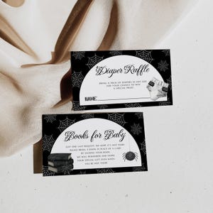 May include: Two black and white baby shower invitation cards. One card says "Diaper Raffle" and the other says "Books for Baby". Both cards have a spiderweb design and illustrations of a diaper and a spider.