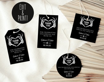 May include: Black and white thank you tags with a skeleton hand heart design. The text reads "Thank You" and "For celebrating our special day with us!" with the names "Sabrina & Corbin" and the date "10.14.28".
