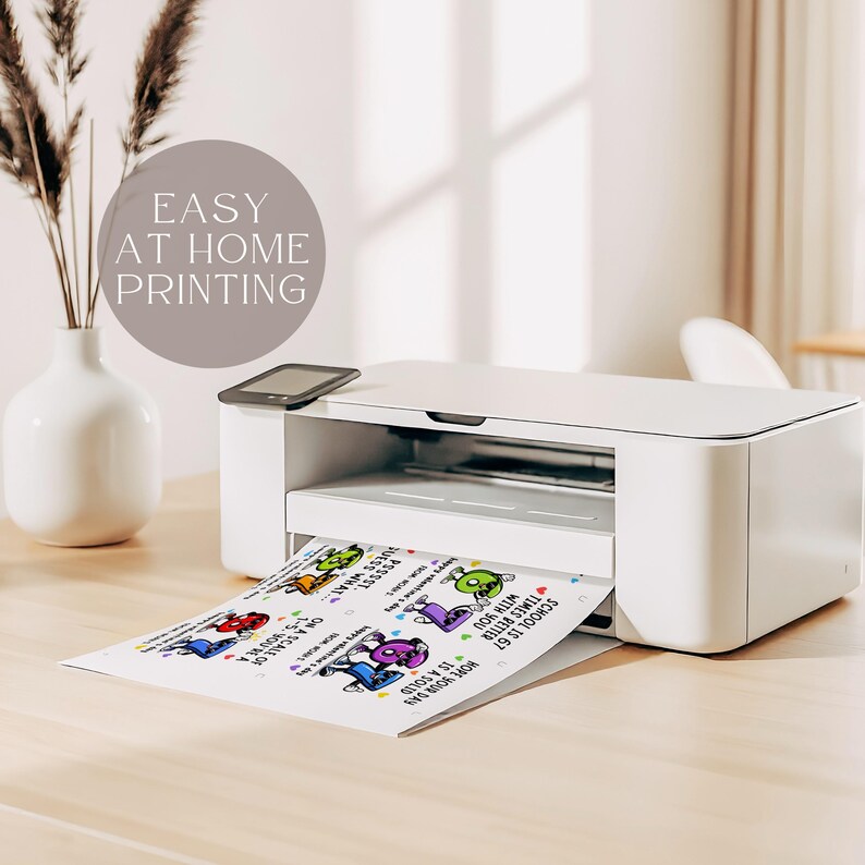 May include: A white printer is printing a sheet of paper with colorful cartoon characters and text. The text on the paper includes phrases like "School is 67 times better with you" and "How your day is a solid". The image also includes the text "Easy at home printing".