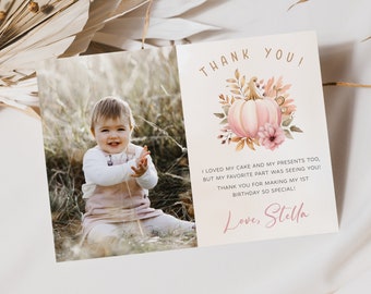 May include: A pink and white pumpkin with autumn leaves and flowers on a thank you card. The card says "Thank You! I loved my cake and my presents too, but my favourite part was seeing you! Thank you for making my 1st birthday so special! Love, Stella."