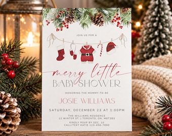 May include: A white rectangular baby shower invitation card featuring a watercolor illustration of a clothesline with a stocking, mittens, a Santa suit, a candy cane, and a hat. The text reads: JOIN US FOR A merry little BABY SHOWER HONORING THE MOMMY-TO-BE JOSIE WILLIAMS SATURDAY, DECEMBER 23 AT 1:00PM THE WILLIAMS RESIDENCE 12 WINTER ST. | TORONTO, ON. M8T3B3 KINDLY RSVP BY DEC. 10 CALL/TEXT KATIE 123-456-7890.