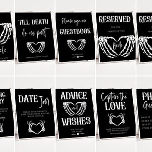 May include: Ten black and white signs with skeleton hands forming a heart shape. The signs have various wedding-related phrases, such as "Let Love Sparkle", "Till Death Do Us Part", "Please Sign Our Guestbook", "Reserved for the Family of the Bride", "Reserved for the Family of the Groom", "In Loving Memory", "Date Jar", "Advice and Wishes", "Capture the Love", and "Photo Guestbook".