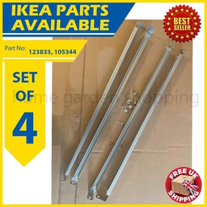 May include: A set of four silver-colored metal IKEA furniture parts, including long, rectangular rails and small screws. The image includes text that reads "IKEA PARTS AVAILABLE" and "SET OF 4".