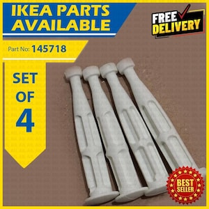 Puede incluir: Un juego de cuatro piezas de mobiliario IKEA de plástico blanco, identificadas con el número de pieza 145718. Cada pieza presenta un cuerpo largo y delgado con una cabeza plana circular en un extremo y una base plana más ancha en el otro.