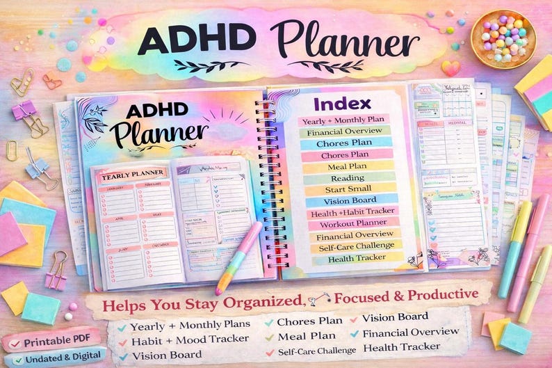 May include: An open ADHD Planner with a spiral binding, featuring a yearly planner and index. The planner includes sections for yearly and monthly plans, chores, meal planning, and more. The cover and pages have a pastel color scheme with the text "ADHD Planner".