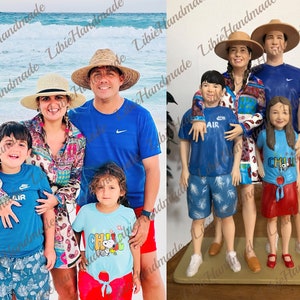 May include: A family of five figurines, painted in realistic detail, wearing casual summer clothing. The figurines are posed in a relaxed, friendly manner, with the parents standing in the center and the children flanking them. The figurines are standing on a beige base.