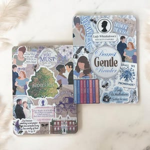 May include: Two decorative square coasters with a collage design featuring illustrations and text from the Bridgerton series. The coasters have a light blue and cream color scheme with text that reads "Dearest Gentle Reader".