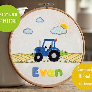 May include: A blue tractor with a yellow sun, white clouds, and green hills embroidered on a white hoop. The name "Evan" is embroidered in colourful letters below the tractor.