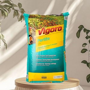May include: A bag of Vigoro Perlite, a soil amendment, is displayed on a wooden surface. The bag is teal and yellow, with text indicating it improves drainage and aeration, prevents soil compaction, and promotes root development.