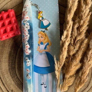 Alice diamond painting pen or stylus, it is made of epoxy resin, delivered with its matching bookmark