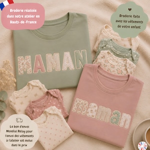 Peut inclure: Deux t-shirts, l'un vert sauge et l'autre vieux rose, ornés du mot MAMAN brodé en lettres de tissus fleuris et rayés, accompagnés de plusieurs bodies pour nourrissons aux motifs floraux et aux tons pastel assortis.