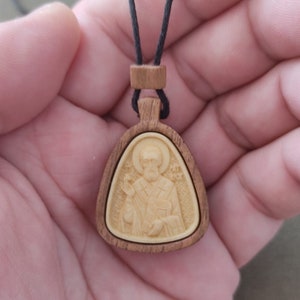 St. Patrick. Pendant around the neck. A Christian saint.The patron saint of Ireland and Nigeria.Carved wooden icon handmade.Gift.Souvenir