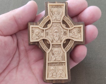 Cross on the front door.Jesus Christ.The Most Holy Theotokos.John the Baptist.Apostles Michael. Gabriel.Saint Nicholas.Sergius of Radonezh