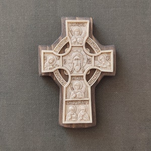 Cross on the front door.Jesus Christ.The Most Holy Theotokos.John the Baptist.Apostles Michael. Gabriel.Saint Nicholas.Sergius of Radonezh image 6