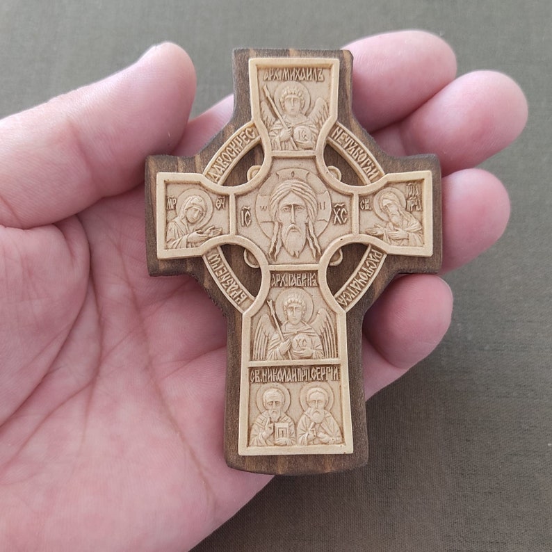 Cross on the front door.Jesus Christ.The Most Holy Theotokos.John the Baptist.Apostles Michael. Gabriel.Saint Nicholas.Sergius of Radonezh image 1