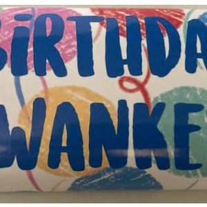 May include: A white card with a colorful balloon pattern and the text "Birthday Wanker" in blue.