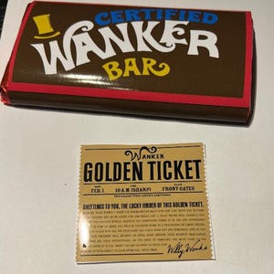 May include: A brown chocolate bar with the text "CERTIFIED WANKER BAR" in white and yellow. A "Golden Ticket" is below, with text including "WANKER GOLDEN TICKET" and "Willy Wonka".