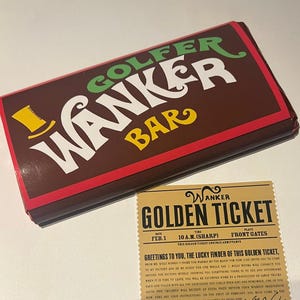 May include: A brown candy bar with the text "GOLFER WANKER BAR" in green, white, and yellow. A golden ticket with text is next to the candy bar. The ticket reads "WANKER GOLDEN TICKET".