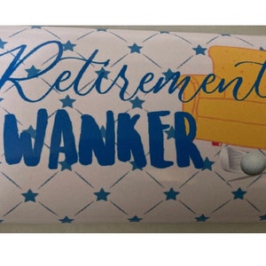May include: A white and blue patterned card with the text "Retirement Wanker" in blue. The card features a cartoon image of a beer mug, a yellow armchair, and a golf club.